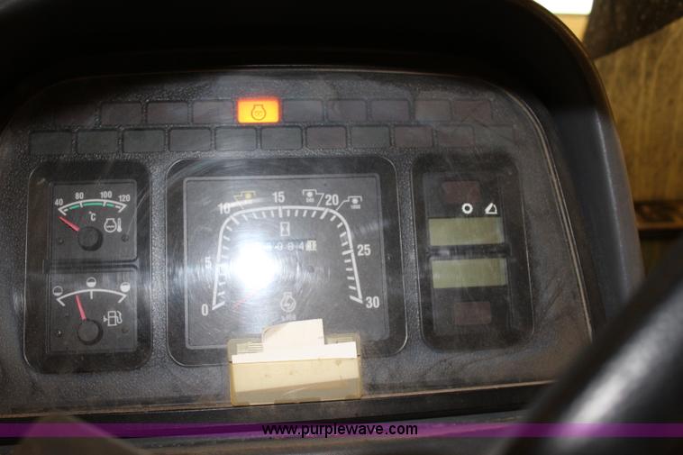 image for item J3514 1999 New Holland TS110 tractor