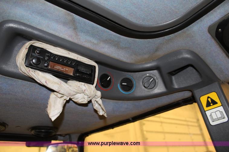 image for item J3514 1999 New Holland TS110 tractor