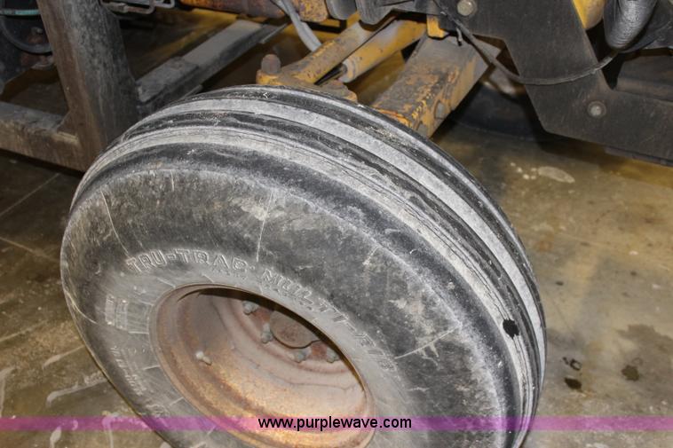 image for item J3514 1999 New Holland TS110 tractor