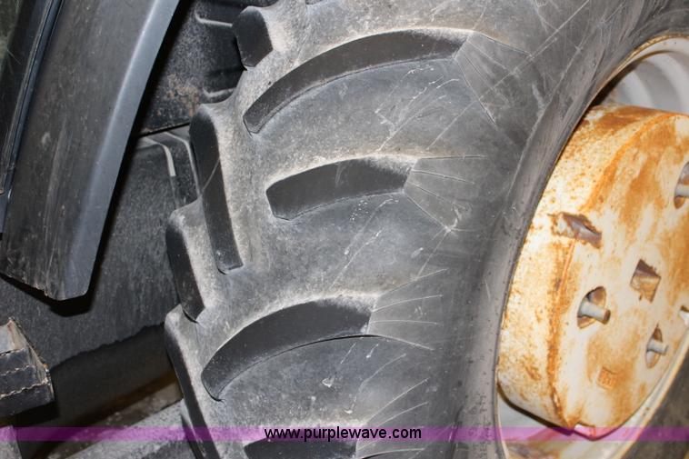 image for item J3514 1999 New Holland TS110 tractor