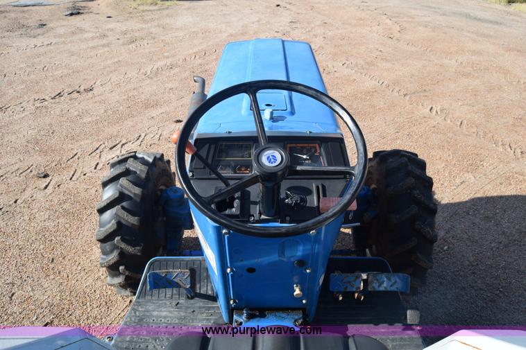 image for item J8122 New Holland 2120 tractor