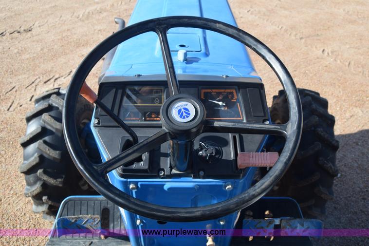 image for item J8122 New Holland 2120 tractor