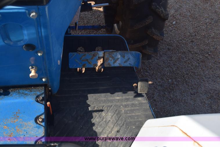 image for item J8122 New Holland 2120 tractor