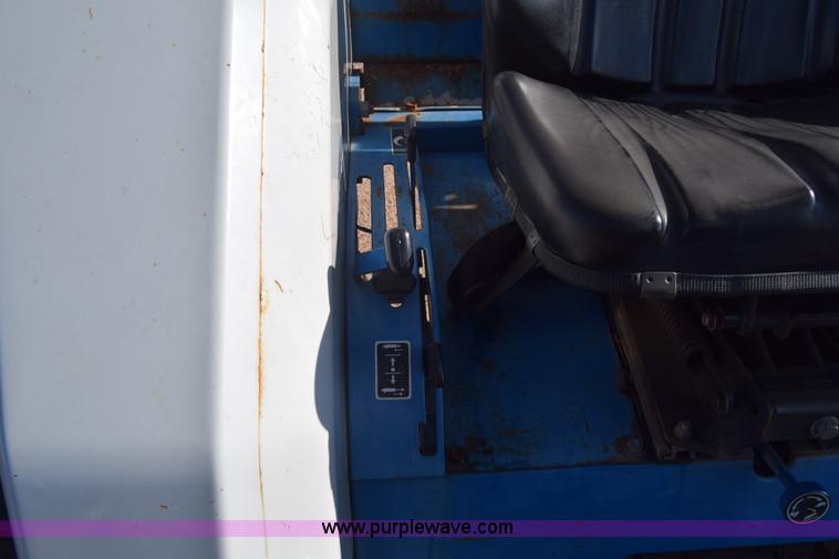 image for item J8122 New Holland 2120 tractor