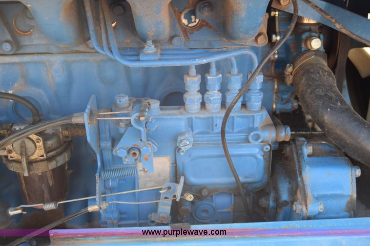 image for item J8122 New Holland 2120 tractor