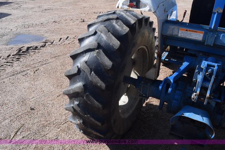 image for item J8122 New Holland 2120 tractor