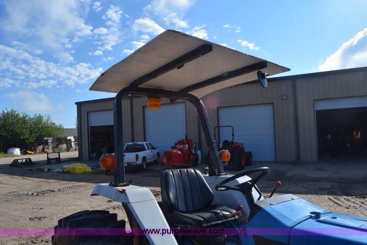 image for item J8122 New Holland 2120 tractor