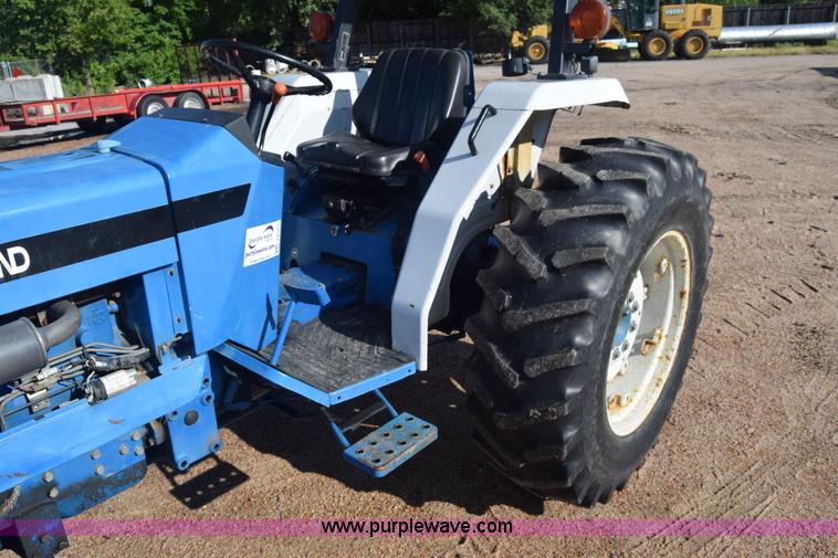 image for item J8122 New Holland 2120 tractor