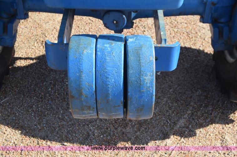 image for item J8122 New Holland 2120 tractor