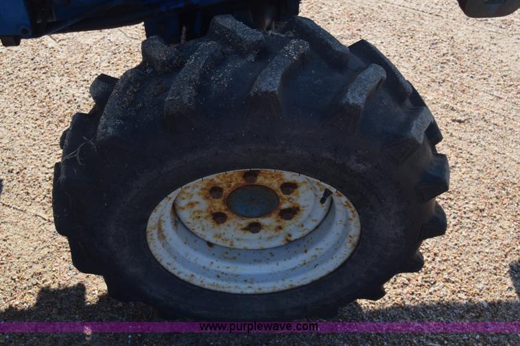 image for item J8122 New Holland 2120 tractor