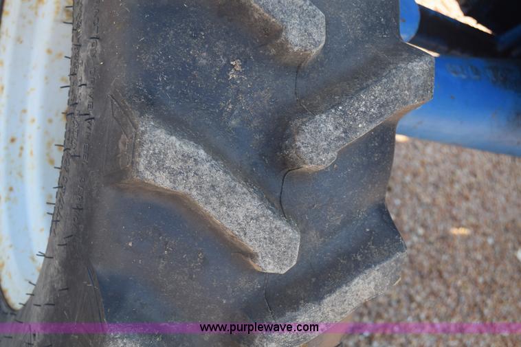 image for item J8122 New Holland 2120 tractor