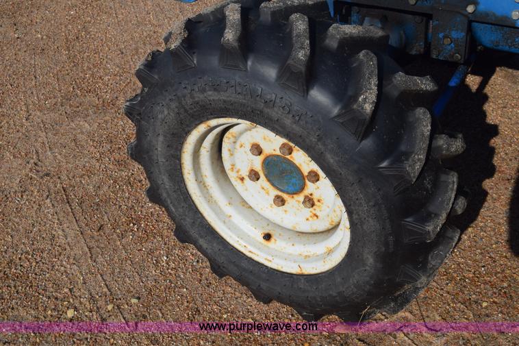 image for item J8122 New Holland 2120 tractor