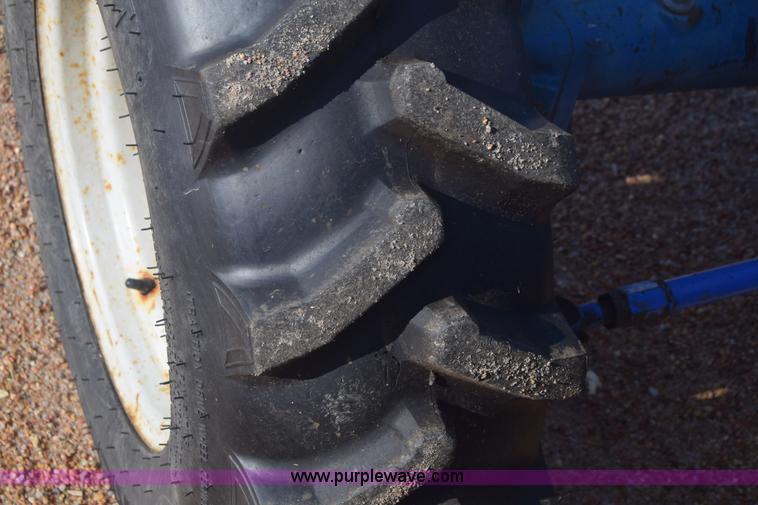 image for item J8122 New Holland 2120 tractor