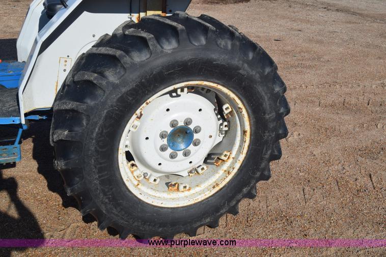 image for item J8122 New Holland 2120 tractor