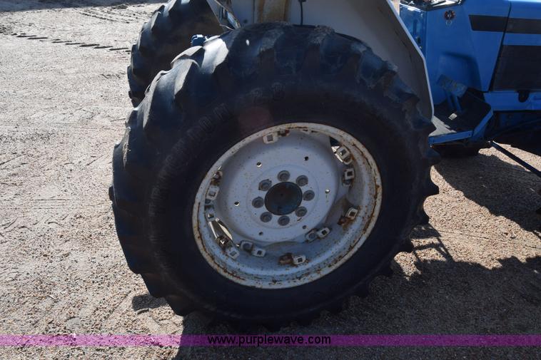 image for item J8122 New Holland 2120 tractor