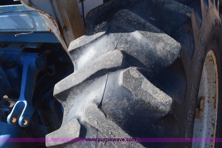 image for item J8122 New Holland 2120 tractor