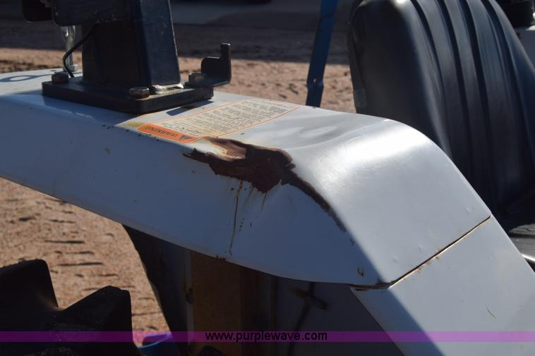 image for item J8122 New Holland 2120 tractor