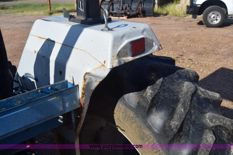 image for item J8122 New Holland 2120 tractor