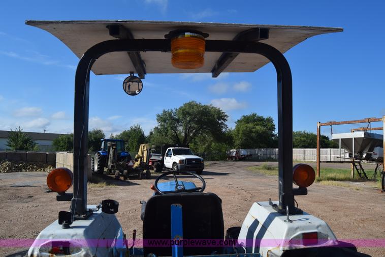 image for item J8122 New Holland 2120 tractor