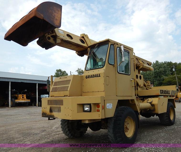 image for item K1627 1985 Gradall G3WD rubber tire excavator