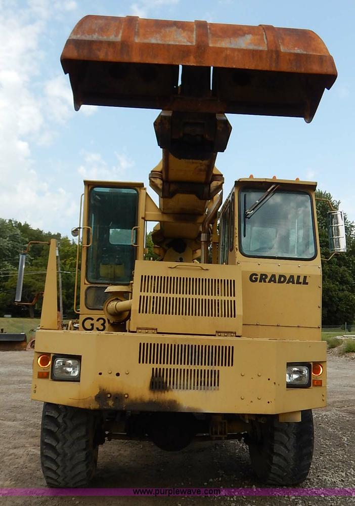 image for item K1627 1985 Gradall G3WD rubber tire excavator