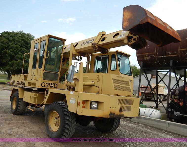 image for item K1627 1985 Gradall G3WD rubber tire excavator