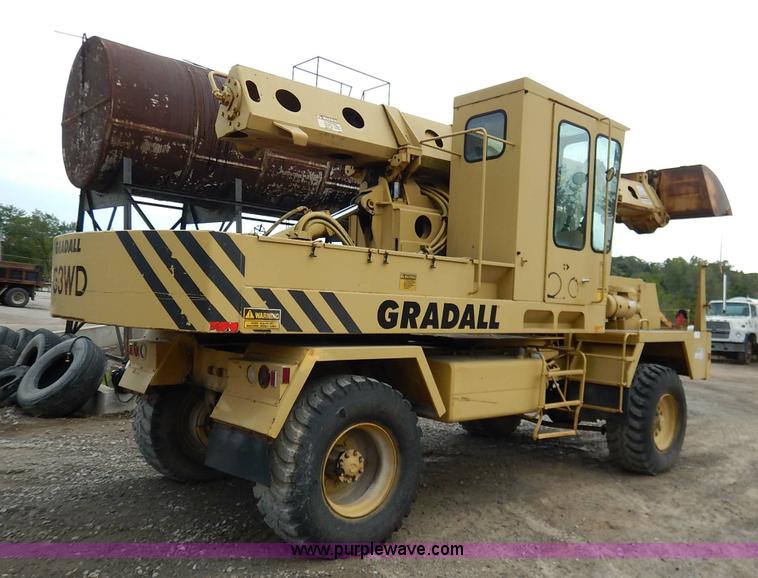 image for item K1627 1985 Gradall G3WD rubber tire excavator