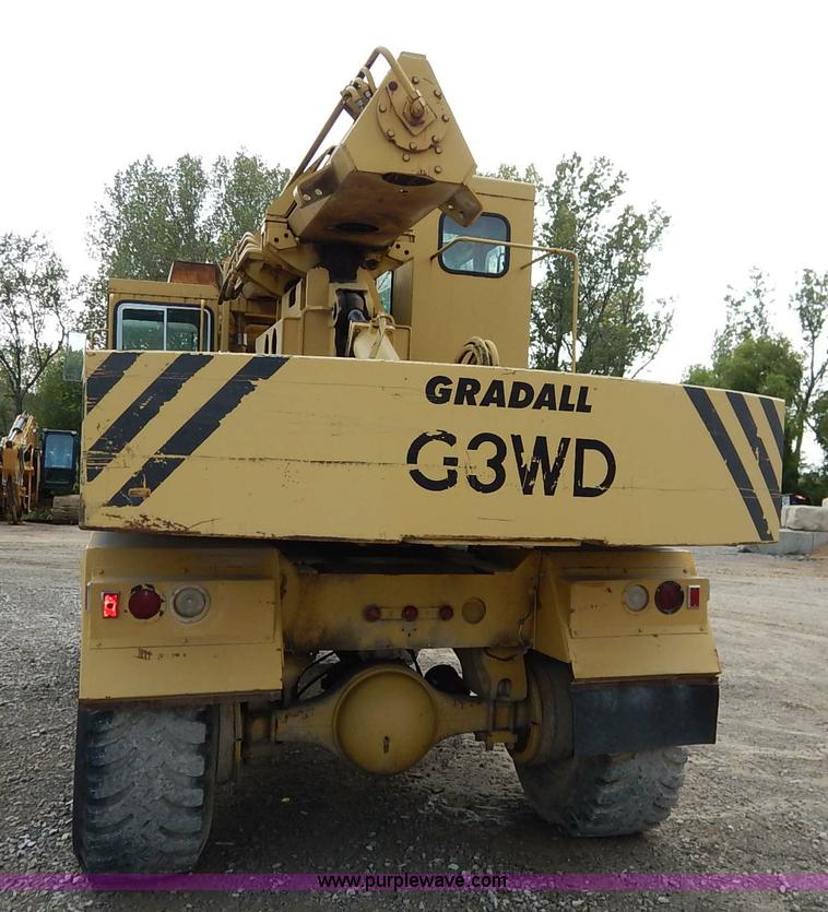 image for item K1627 1985 Gradall G3WD rubber tire excavator