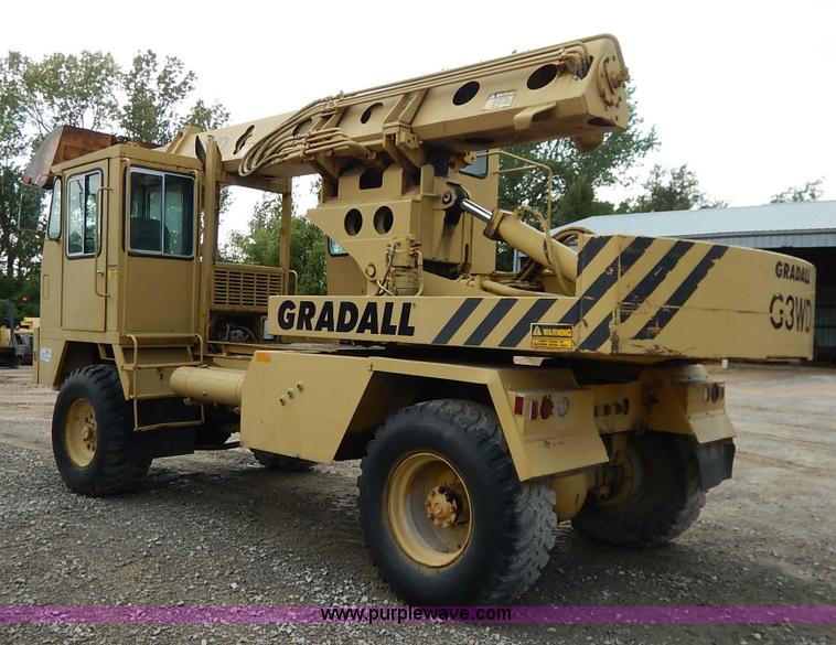 image for item K1627 1985 Gradall G3WD rubber tire excavator