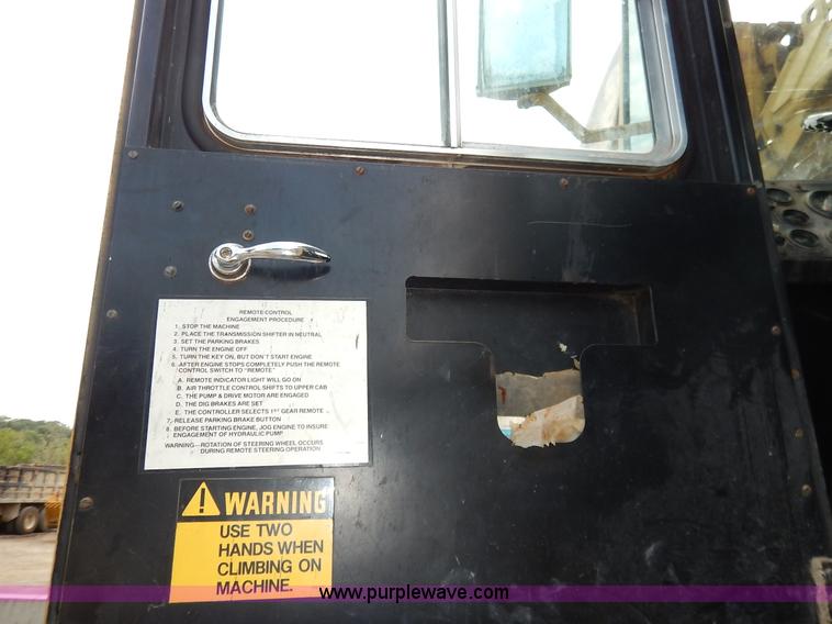 image for item K1627 1985 Gradall G3WD rubber tire excavator