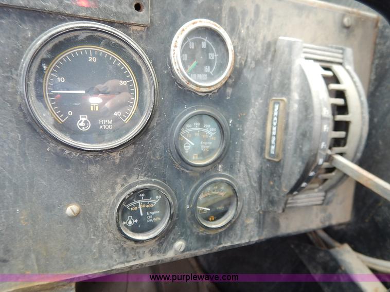 image for item K1627 1985 Gradall G3WD rubber tire excavator