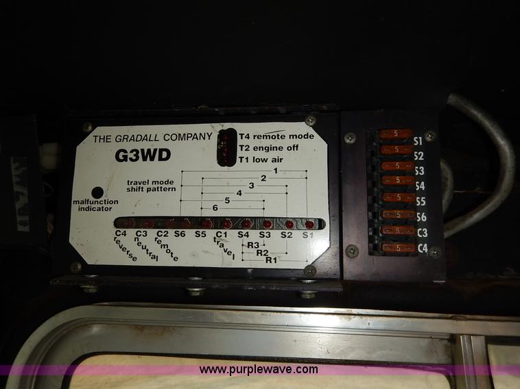 image for item K1627 1985 Gradall G3WD rubber tire excavator