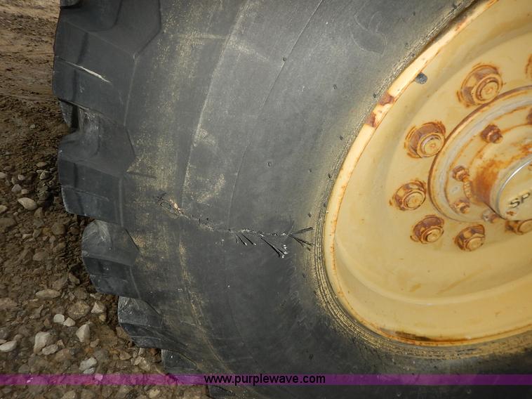 image for item K1627 1985 Gradall G3WD rubber tire excavator