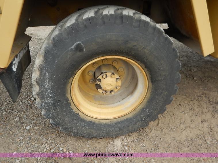 image for item K1627 1985 Gradall G3WD rubber tire excavator