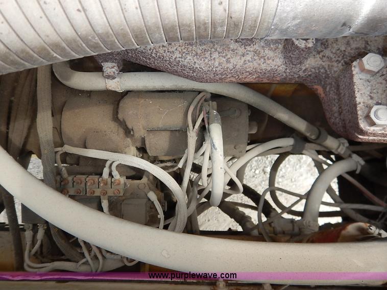 image for item K1627 1985 Gradall G3WD rubber tire excavator