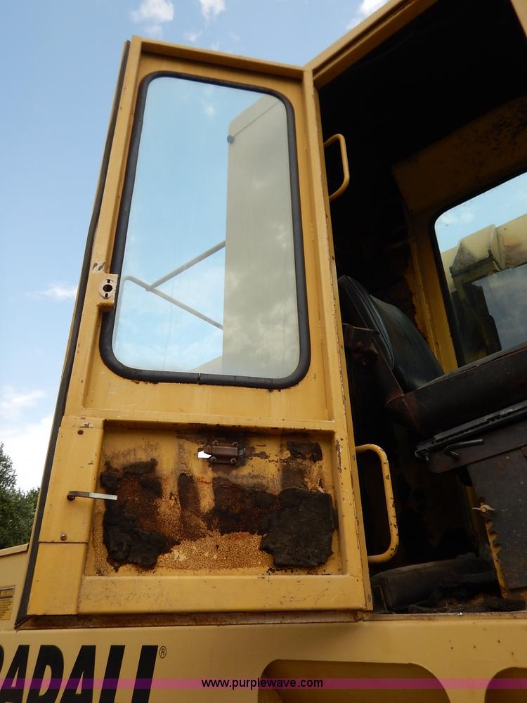 image for item K1627 1985 Gradall G3WD rubber tire excavator