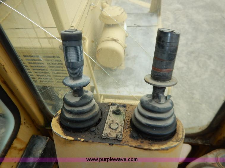 image for item K1627 1985 Gradall G3WD rubber tire excavator