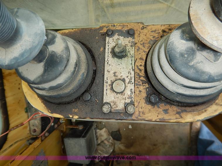 image for item K1627 1985 Gradall G3WD rubber tire excavator