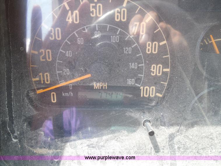 image for item K7527 2003 GMC W5500 flatbed truck with Tiger Truck Kat TRB-50C mower