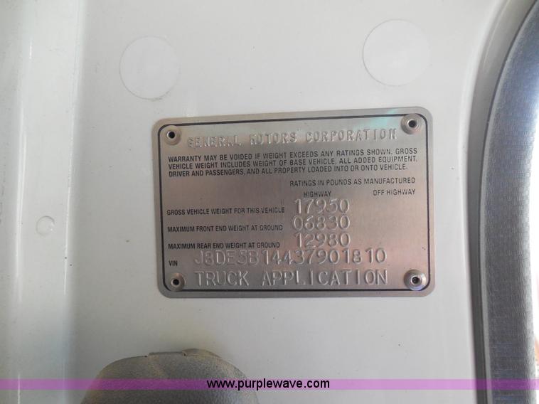 image for item K7527 2003 GMC W5500 flatbed truck with Tiger Truck Kat TRB-50C mower