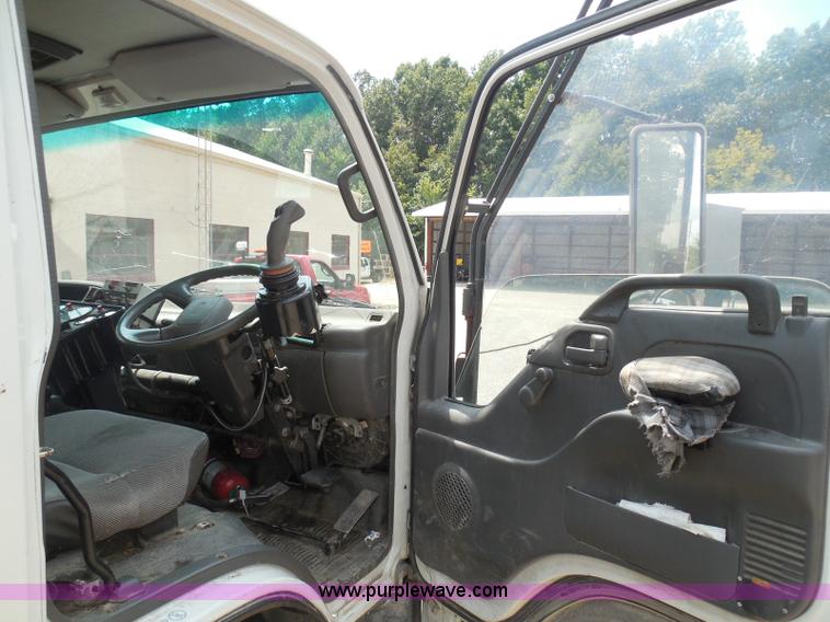 image for item K7527 2003 GMC W5500 flatbed truck with Tiger Truck Kat TRB-50C mower