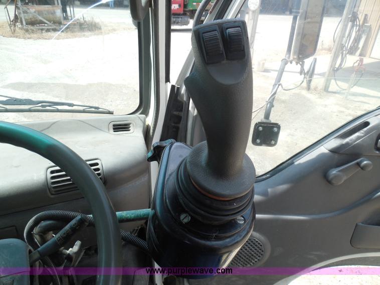 image for item K7527 2003 GMC W5500 flatbed truck with Tiger Truck Kat TRB-50C mower