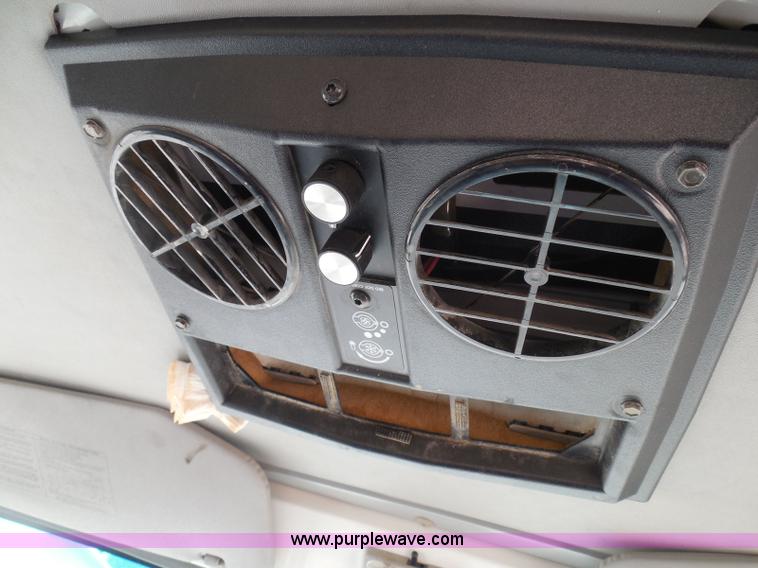 image for item K7527 2003 GMC W5500 flatbed truck with Tiger Truck Kat TRB-50C mower