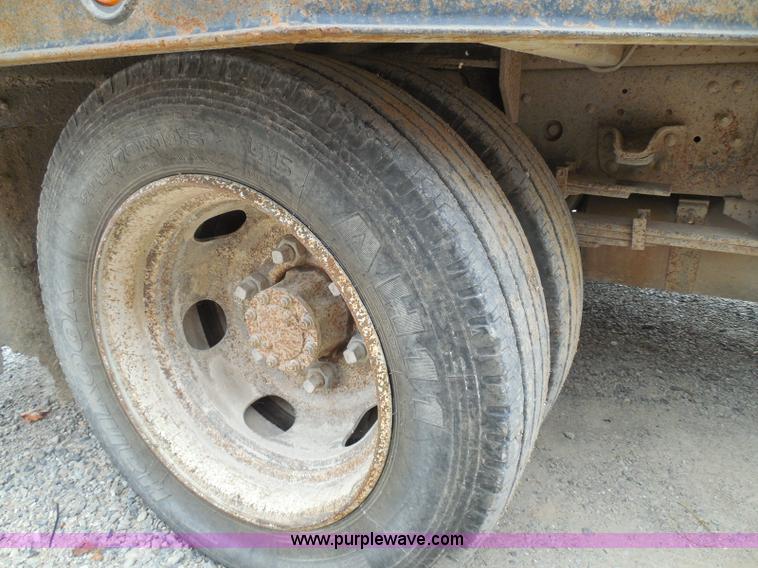 image for item K7527 2003 GMC W5500 flatbed truck with Tiger Truck Kat TRB-50C mower