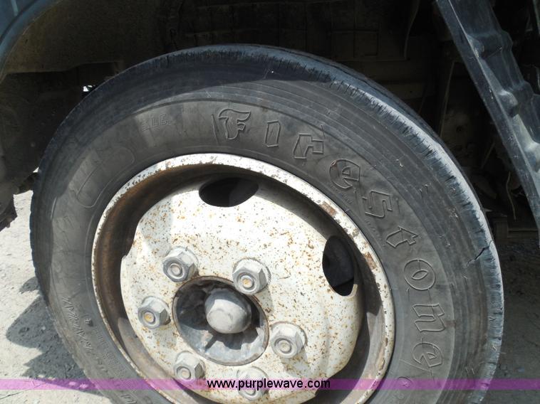 image for item K7527 2003 GMC W5500 flatbed truck with Tiger Truck Kat TRB-50C mower