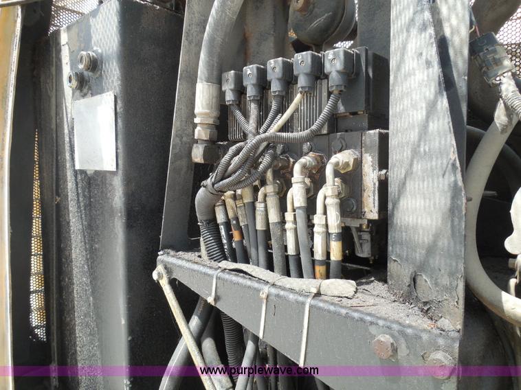 image for item K7527 2003 GMC W5500 flatbed truck with Tiger Truck Kat TRB-50C mower