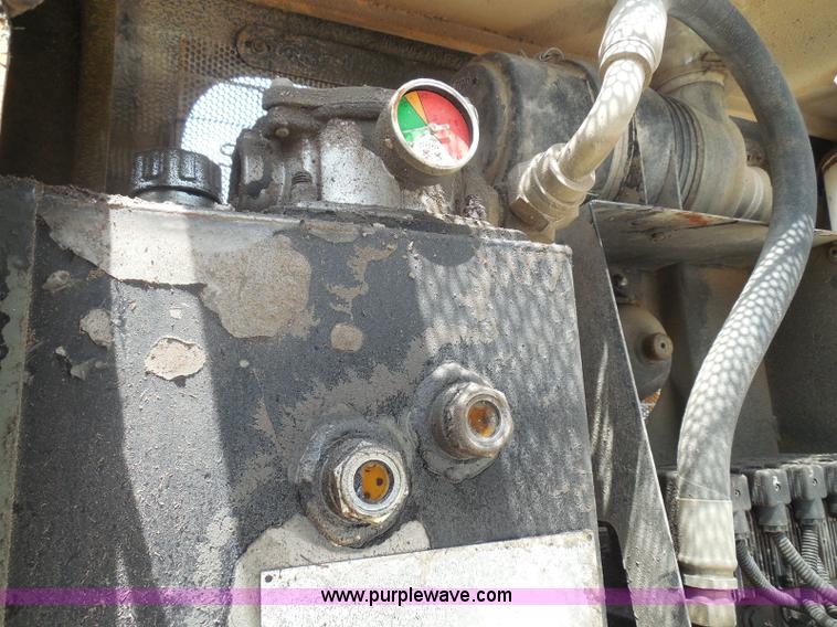 image for item K7527 2003 GMC W5500 flatbed truck with Tiger Truck Kat TRB-50C mower