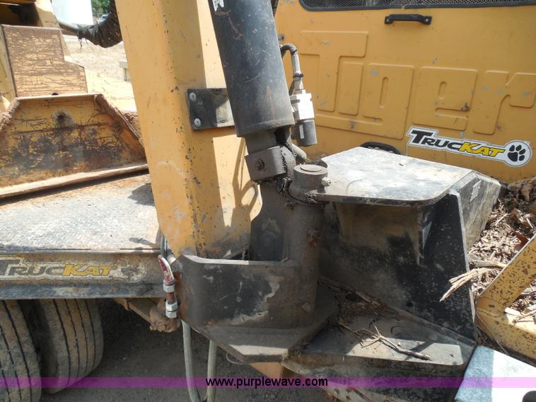 image for item K7527 2003 GMC W5500 flatbed truck with Tiger Truck Kat TRB-50C mower