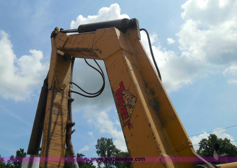 image for item K7527 2003 GMC W5500 flatbed truck with Tiger Truck Kat TRB-50C mower