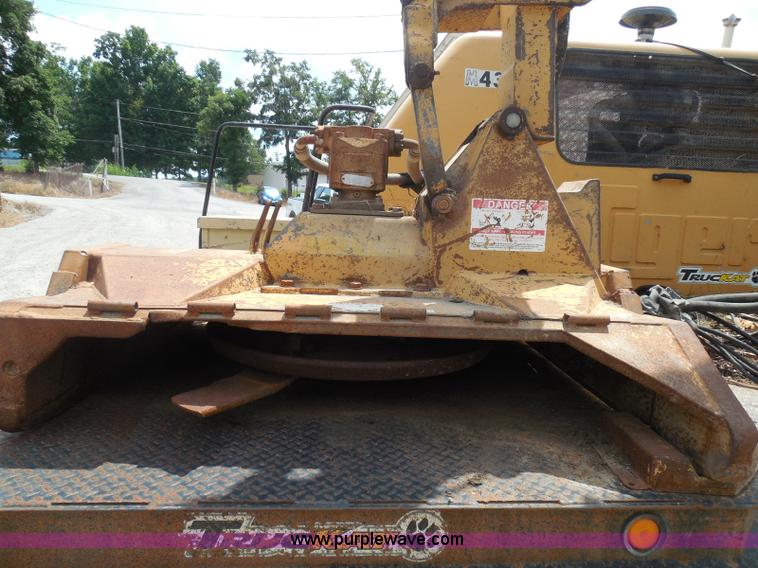 image for item K7527 2003 GMC W5500 flatbed truck with Tiger Truck Kat TRB-50C mower